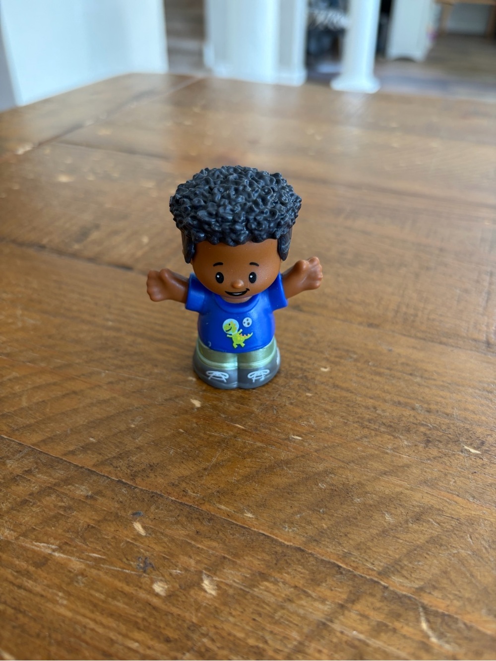 Fisher Price Little People boy with dinosaur shirt as is